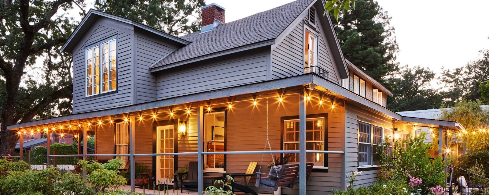 Lavender Inn Yountville exterior porch at dusk with lights