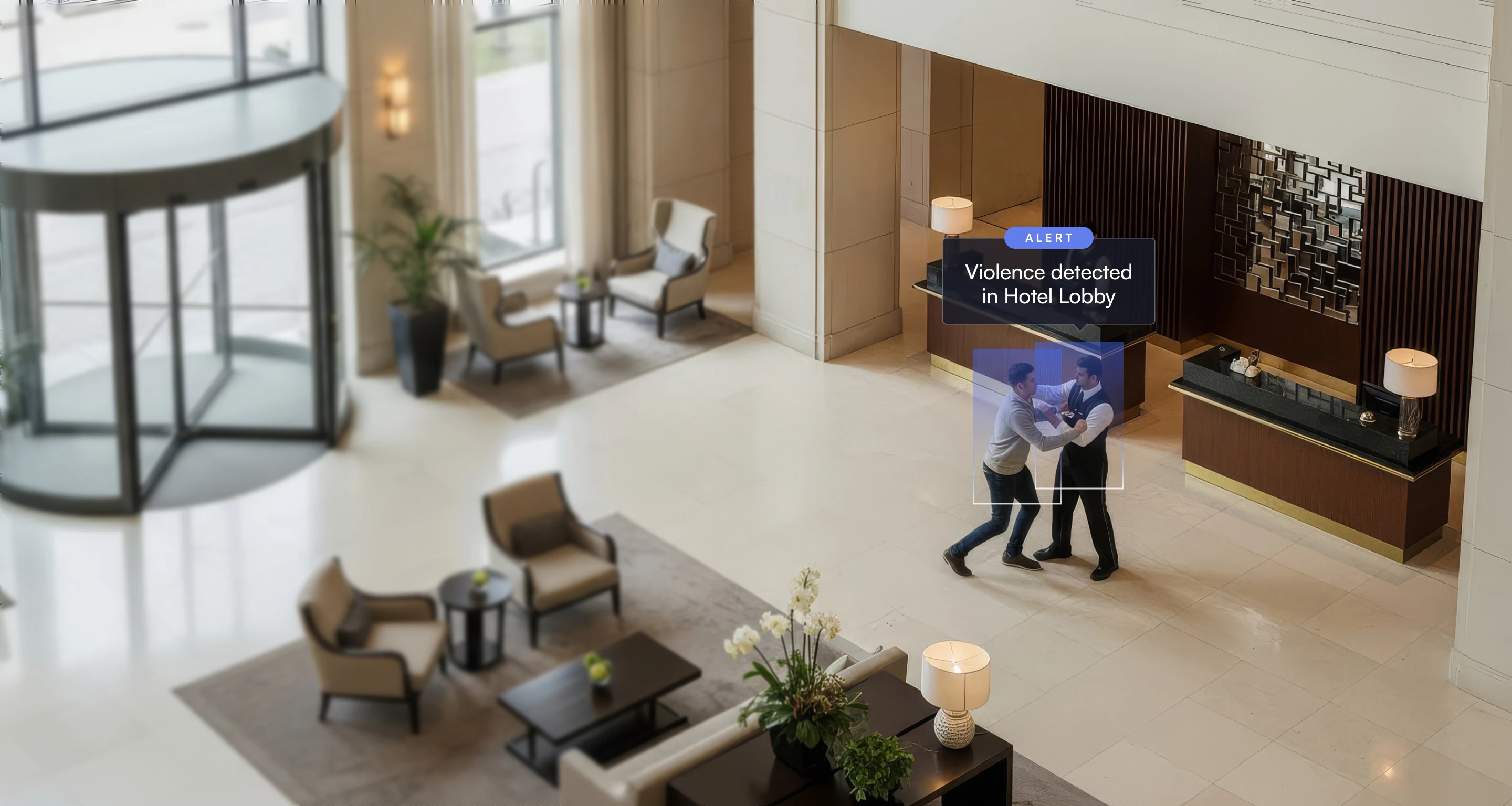 Hotel lobby with two men in a physical altercation near the reception desk, with an alert overlay reading 'Violence detected in Hotel Lobby.'