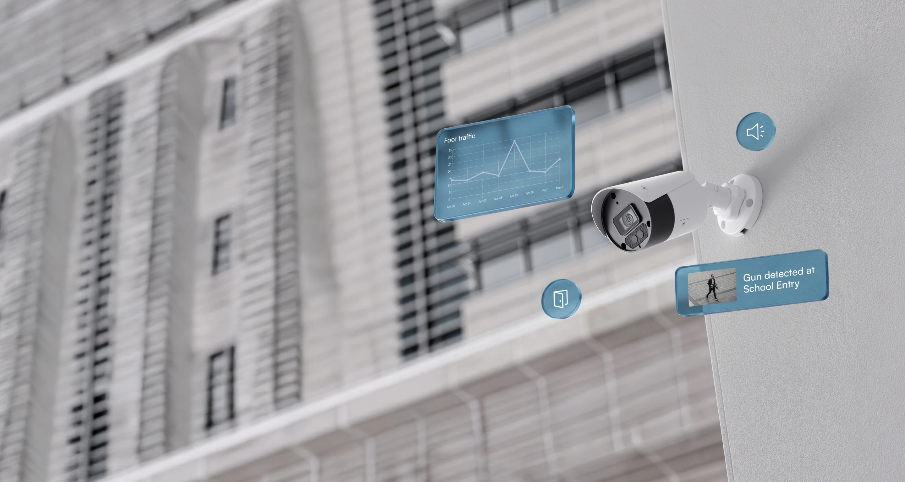 Security camera mounted on a building wall with digital overlays showing foot traffic graph and alert 'Gun detected at School Entry' with a photo of a person.