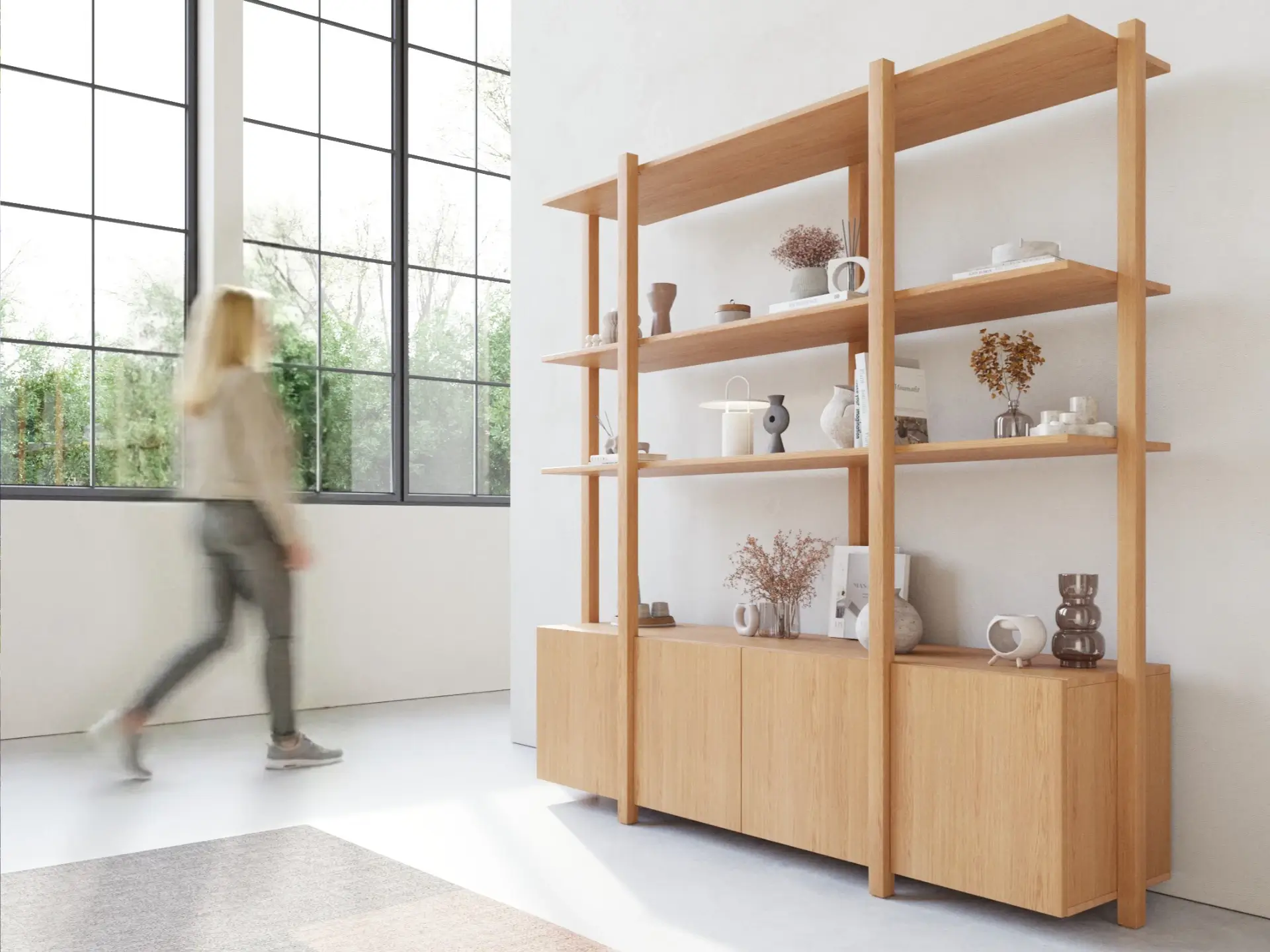 A modern, open-concept workspace filled with natural light and greenery, reflecting the clean and organized design of Nimbus Library.