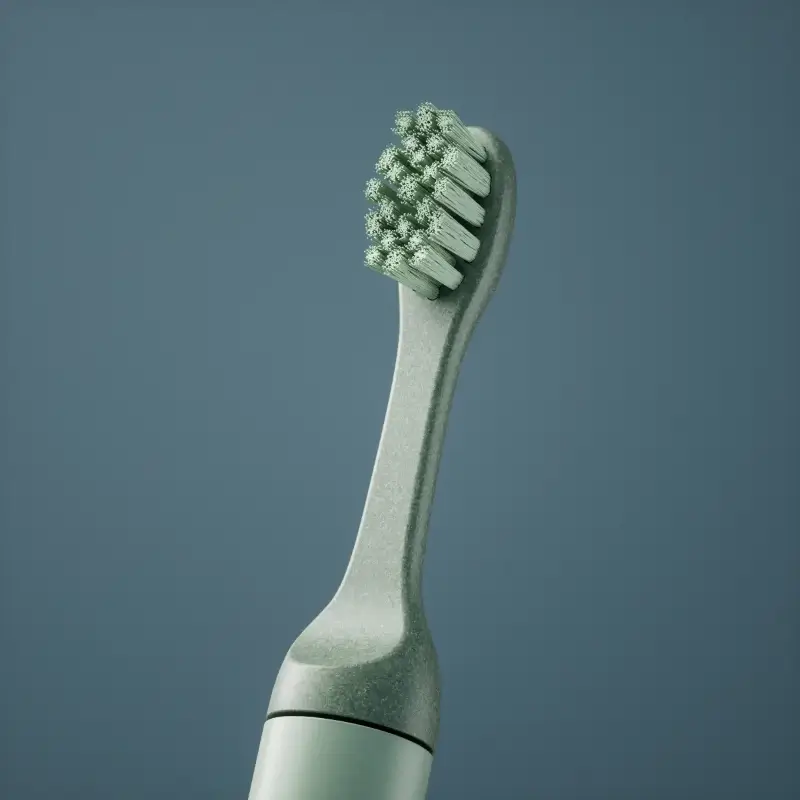 Gedetailleerde 3D-close-up render van de borstelkop en textuur van een groene Brush elektrische tandenborstel.