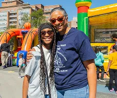 Teacher and child smiling