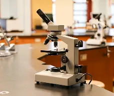 Microscope placed on a lab table inside the school’s science classroom