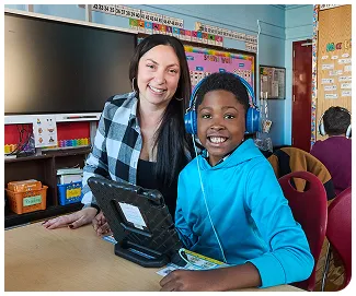 Teacher and student with tablet