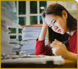 Educator using GRADED+ to analyze grading data and assignment performance with AI-assisted insights