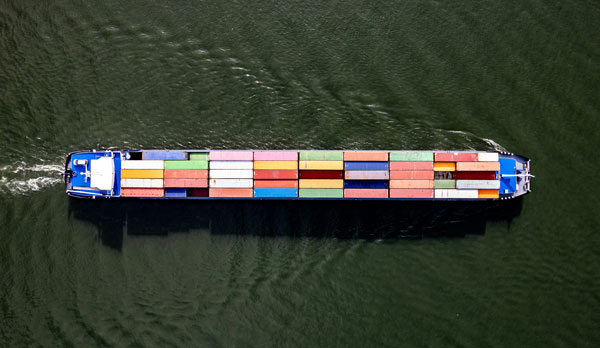 shipping boat ships containers over the sea