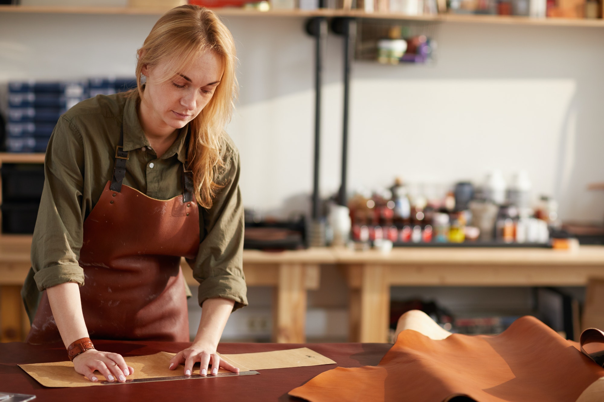 Woman in Leather Shop