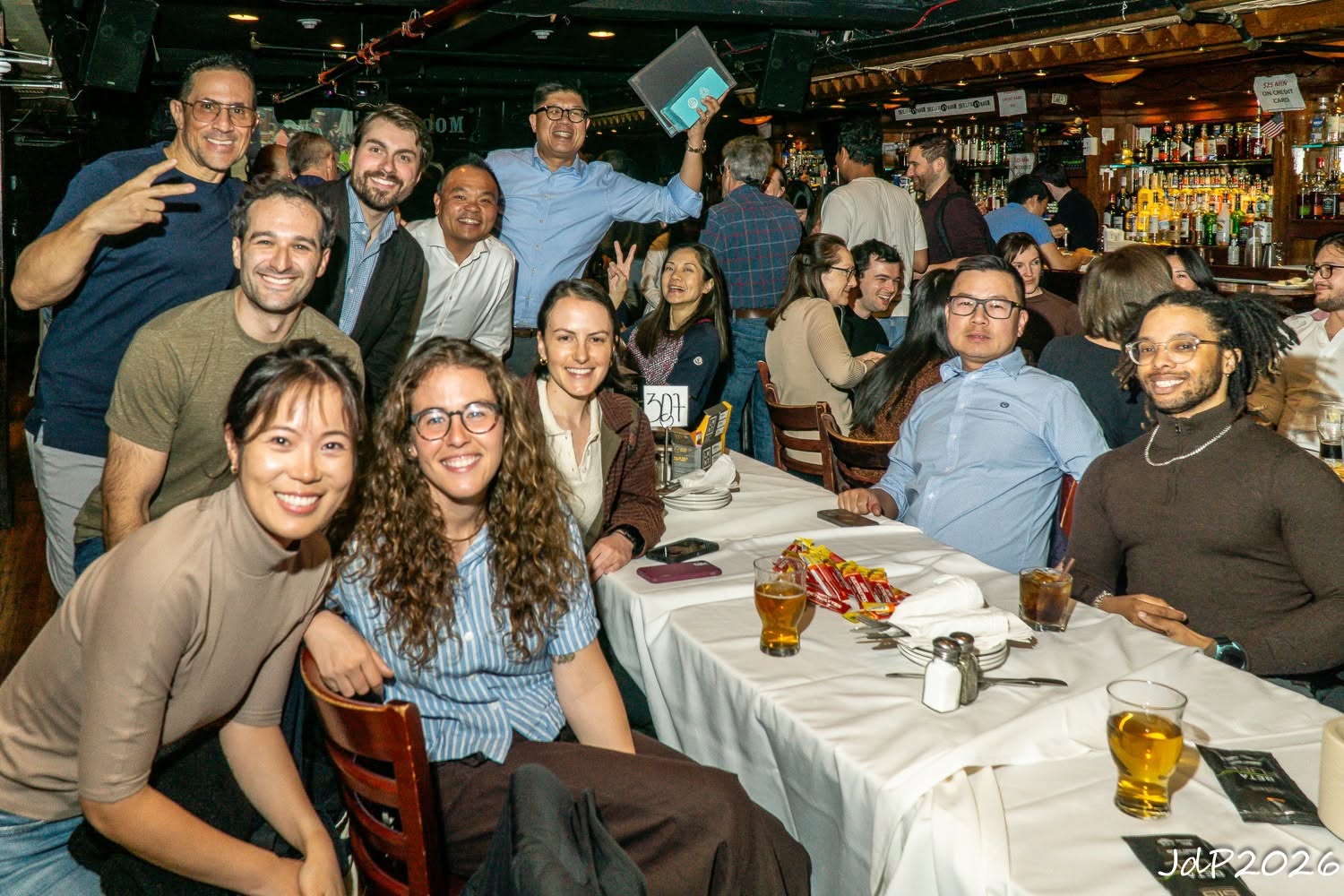 NYCC members smiling together at a social event