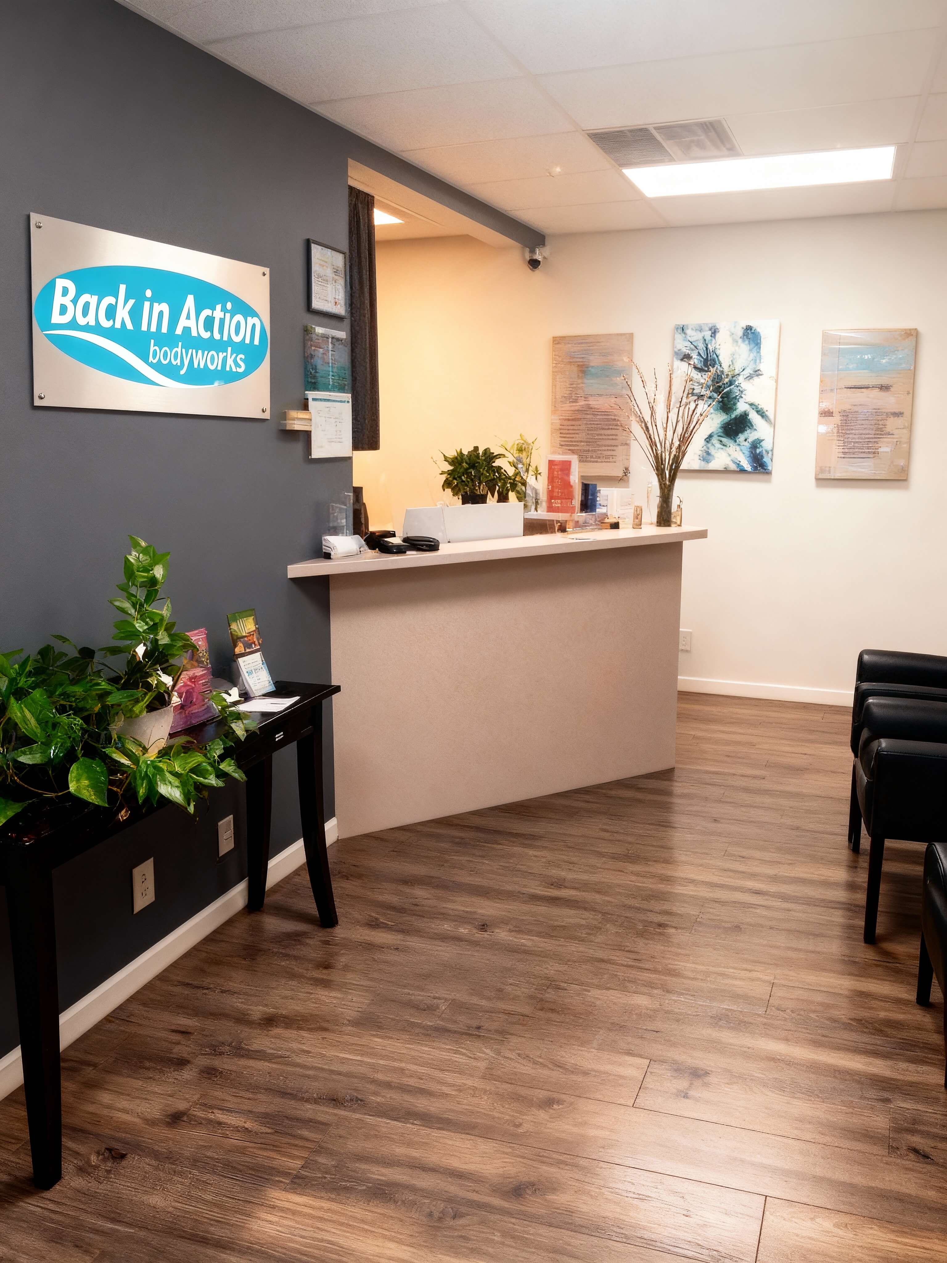 chiropractor adjusting a patient's back