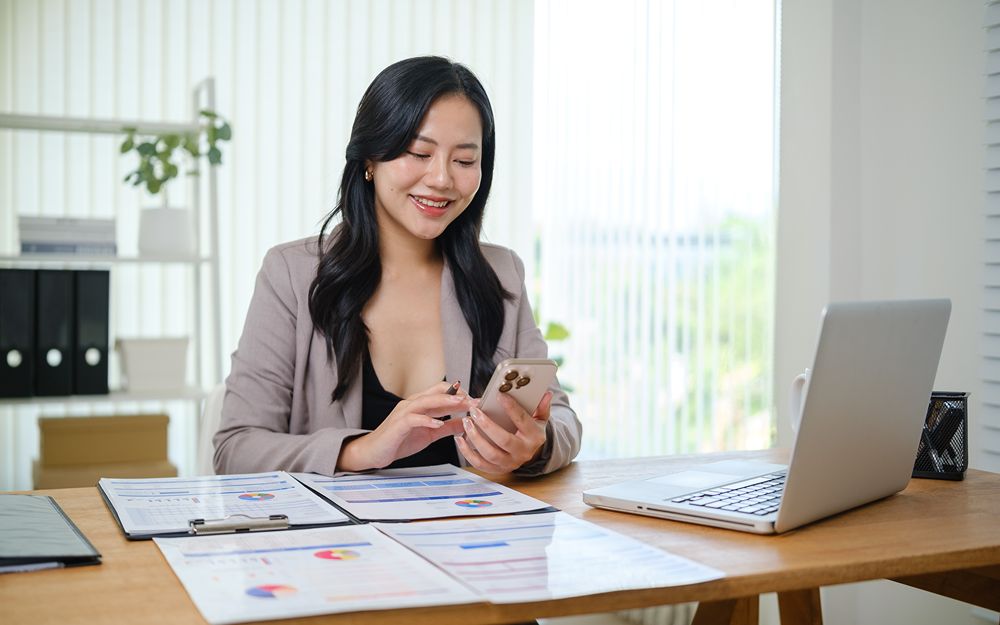 Business owner using a laptop computer in the office