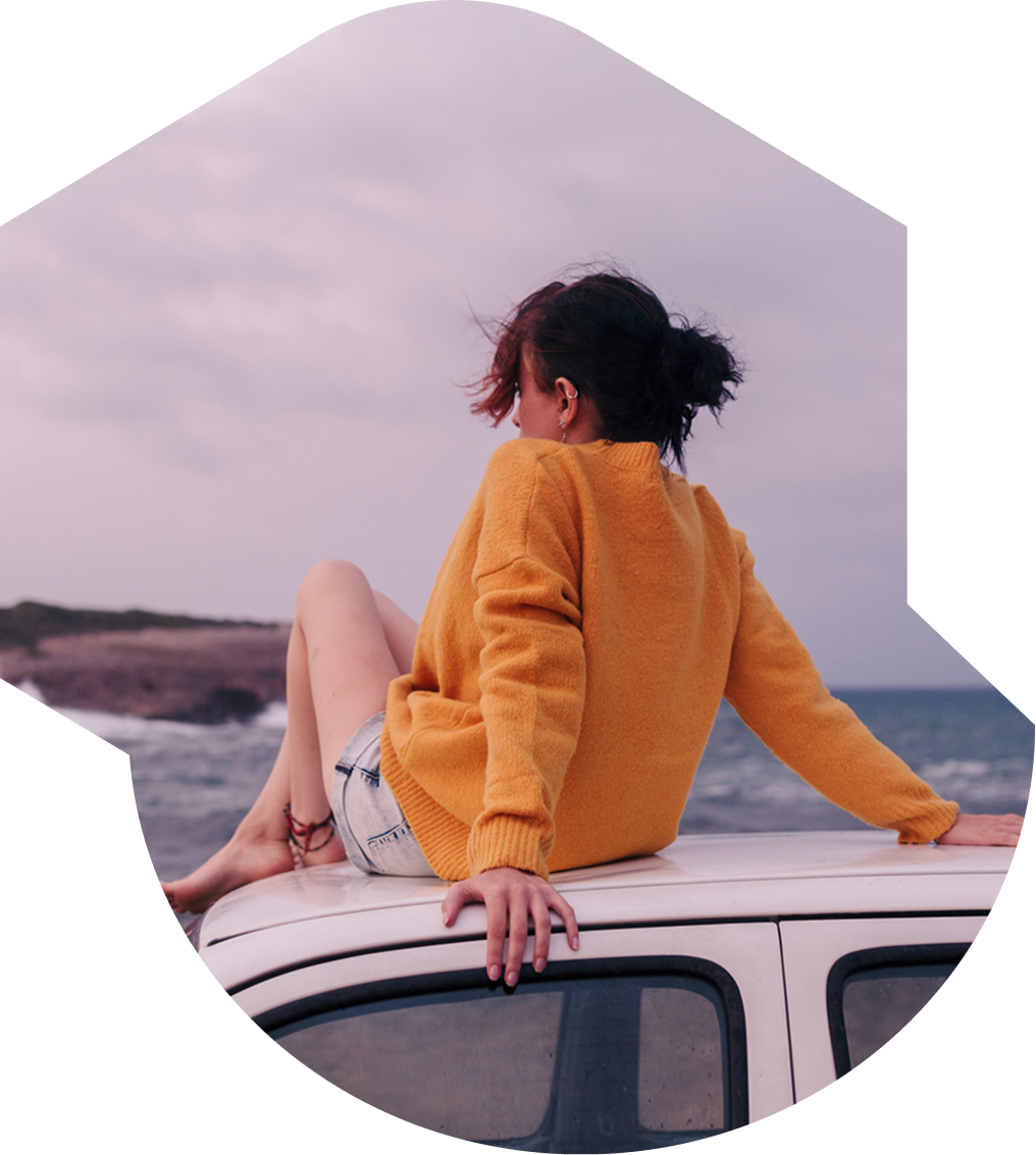 I woman looking out a car window