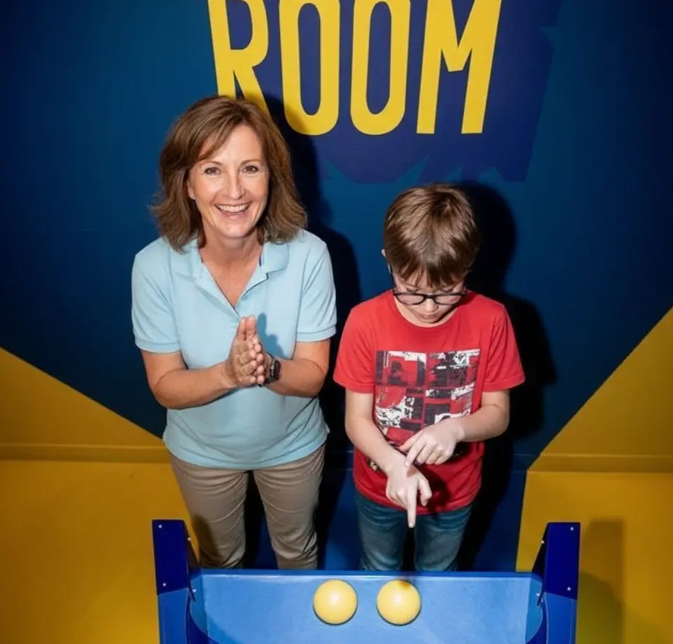 Groupe avec un adulte et un enfant chez quiz room