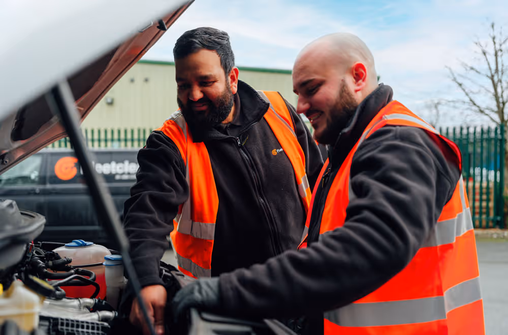 Fleetclear engineers working on an installation.