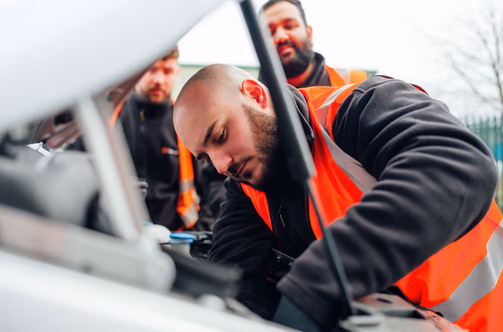 Fleetclear engineer installing vehicle safety system.
