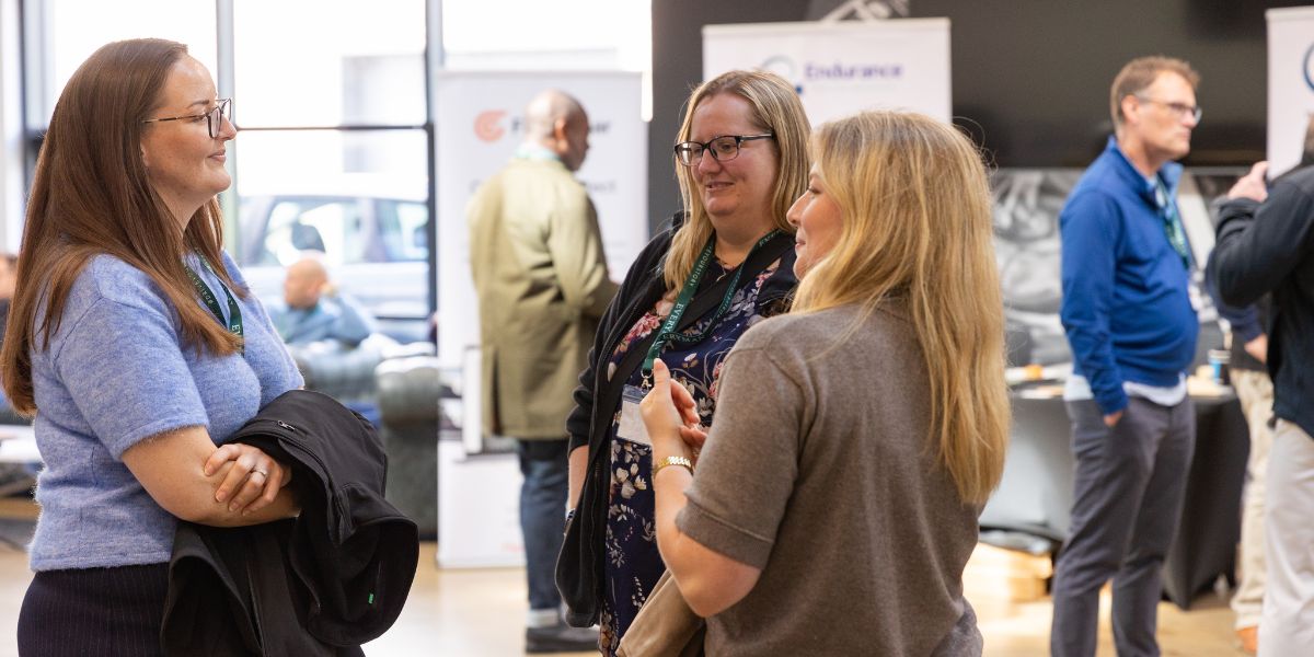 Fleetclear Customers talking among each other at OnTrack event