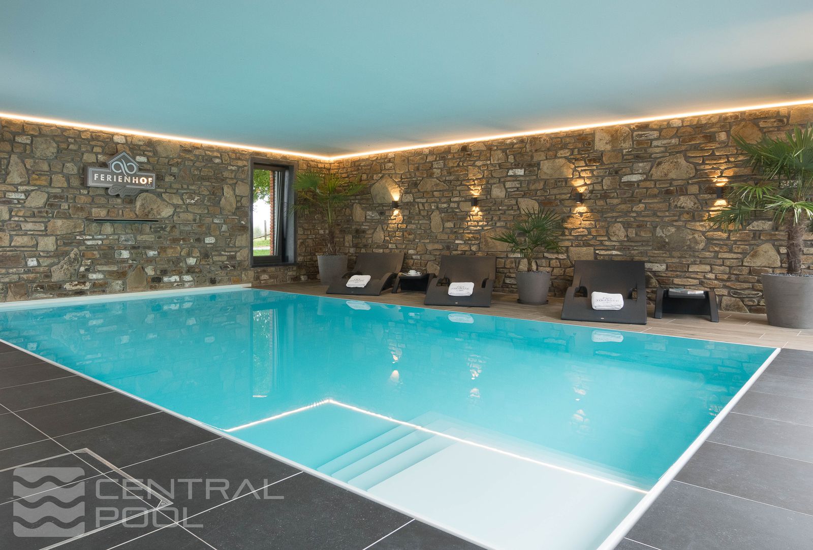 Aqualuxe indoor one-piece overflow pool by Central Pool
