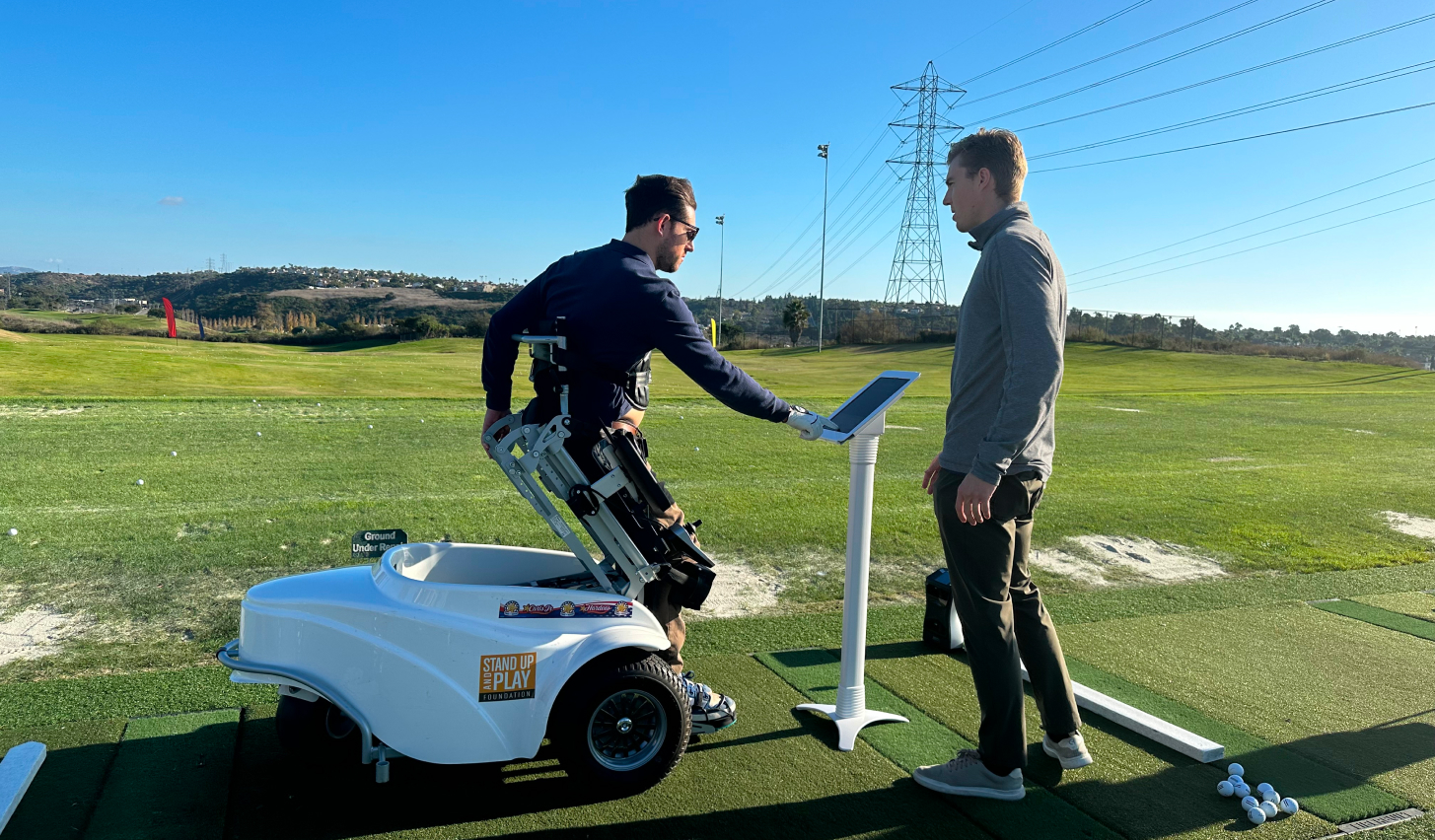 A man utilizing the SmartFit from an assist device