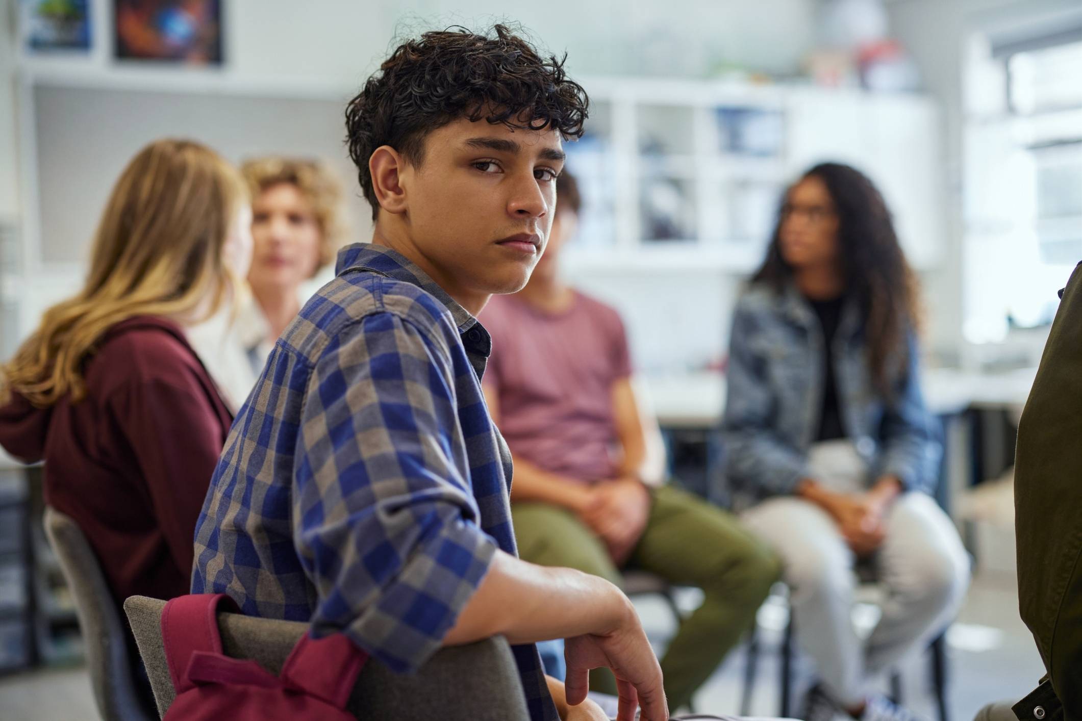 Student participating in support group discussion, representing San Diego institutional sexual abuse lawyer cases.