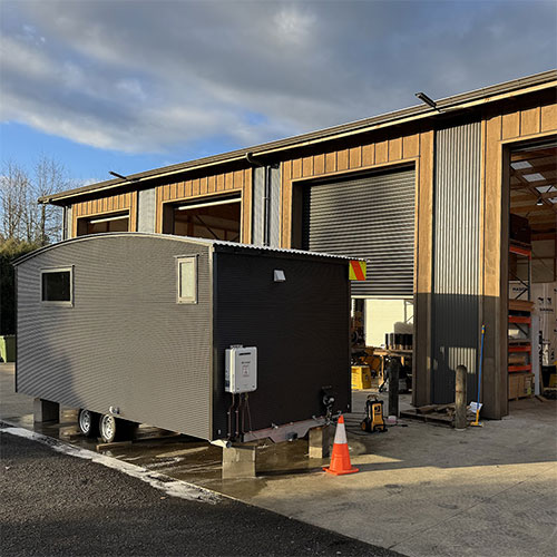 The NORFOLK - 2 room portable cabin with kitchenette and bathroom. Manufactured by Cabins To Go Ltd.
