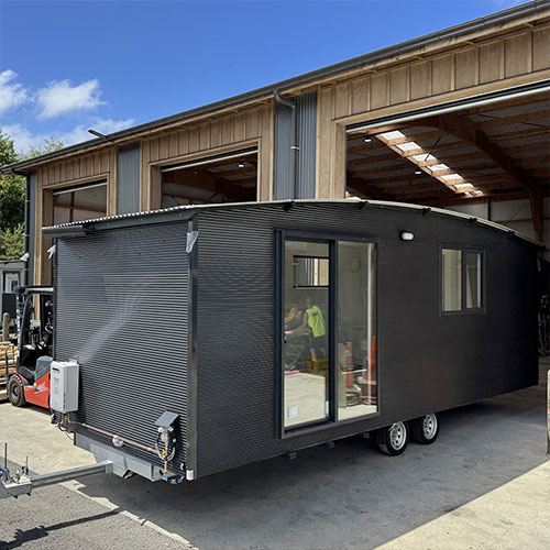 The NORFOLK - 2 room portable cabin with kitchenette and bathroom. Manufactured by Cabins To Go Ltd.