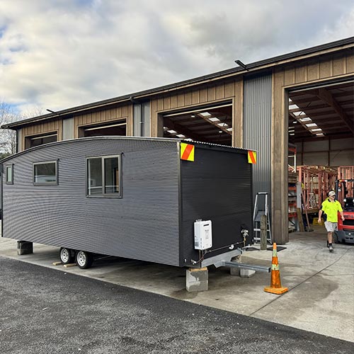 The NORFOLK - 2 room portable cabin with kitchenette and bathroom. Manufactured by Cabins To Go Ltd.