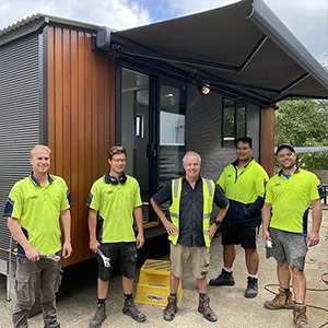 The Cabins To Go building team