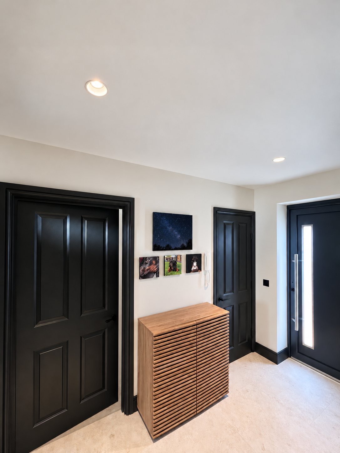Hallway with charcoal doors, Wimbledon flat