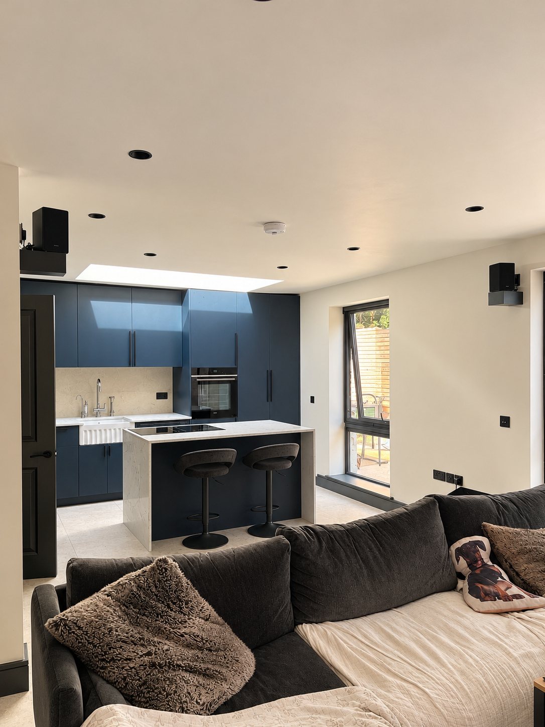 Blue kitchen with island, Wimbledon flat renovation