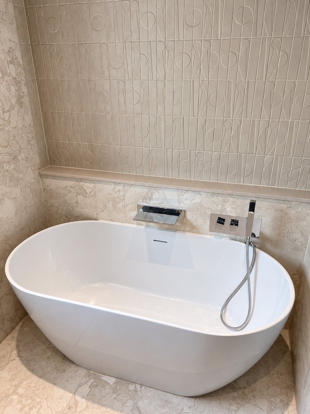Bathroom vanity with dark stone basin