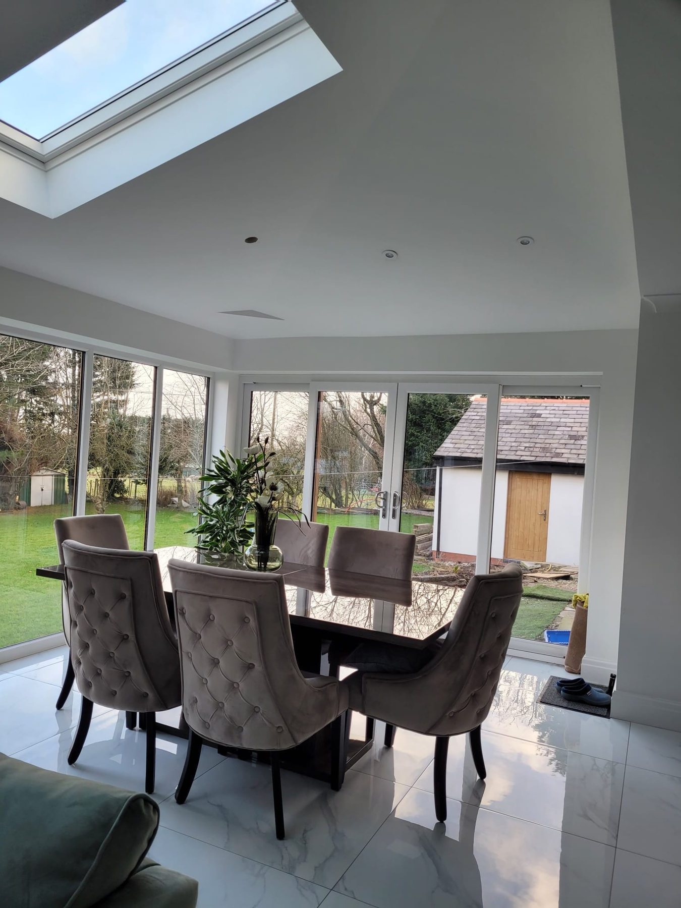 Dining area with glazed doors to the garden, Harrow extension