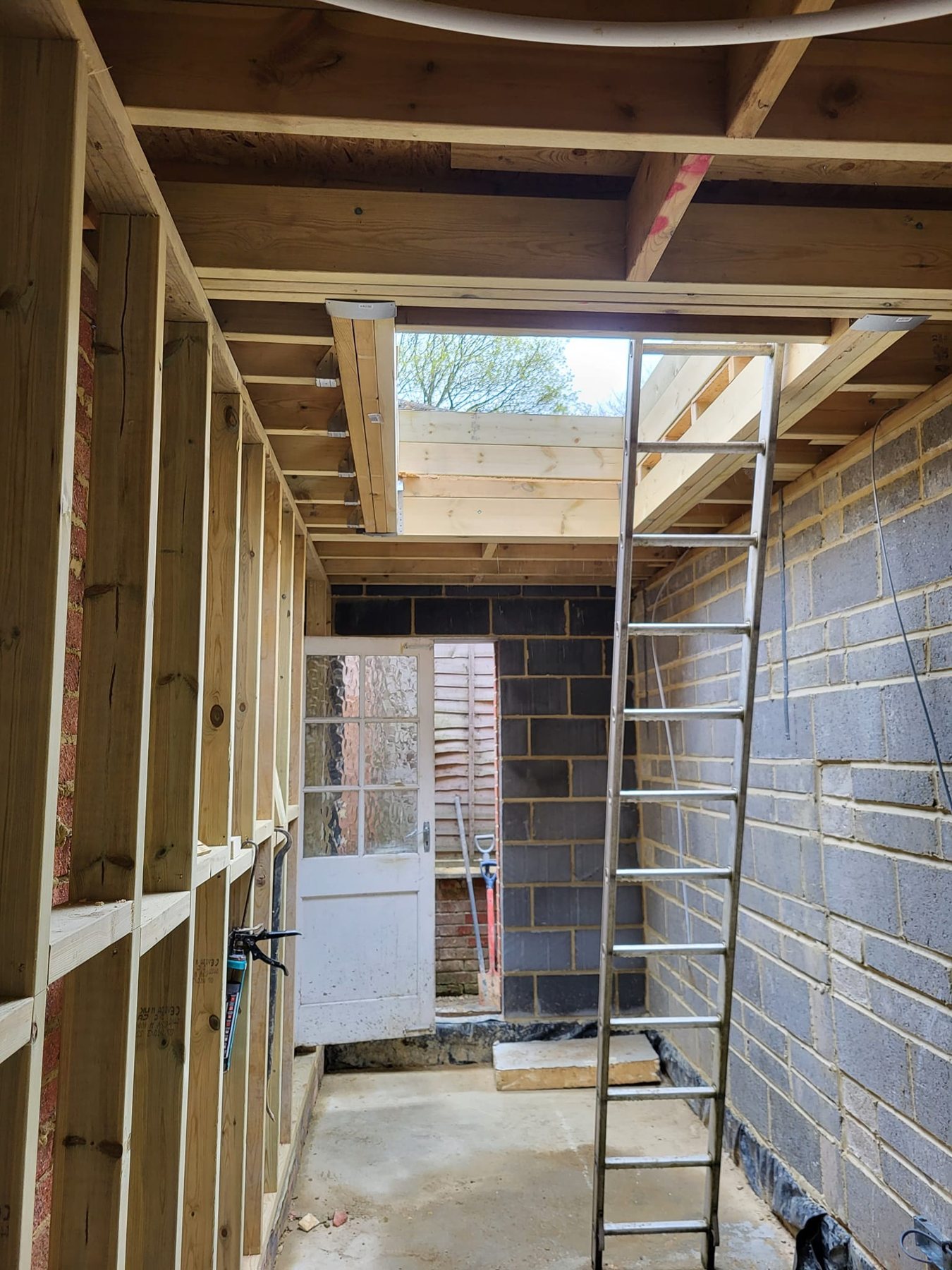 Blockwork and timber roof of the extension