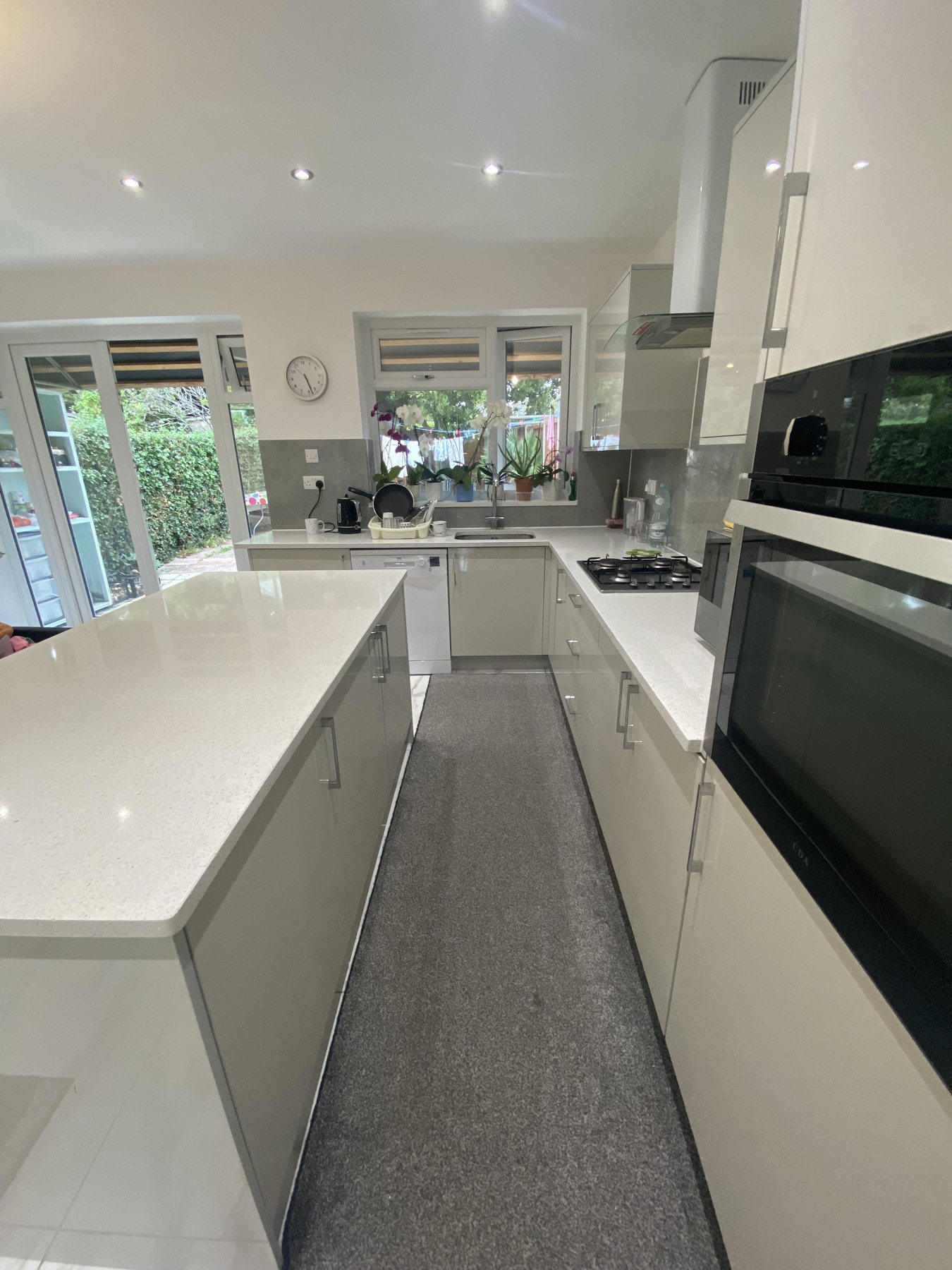 Quartz worktop and integrated ovens, Northolt kitchen