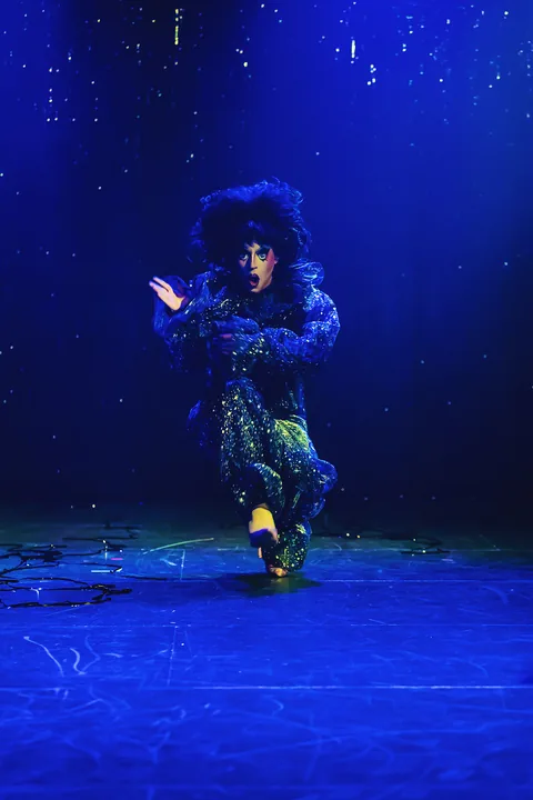 A performer on stage at Brooklyn Art Haus
