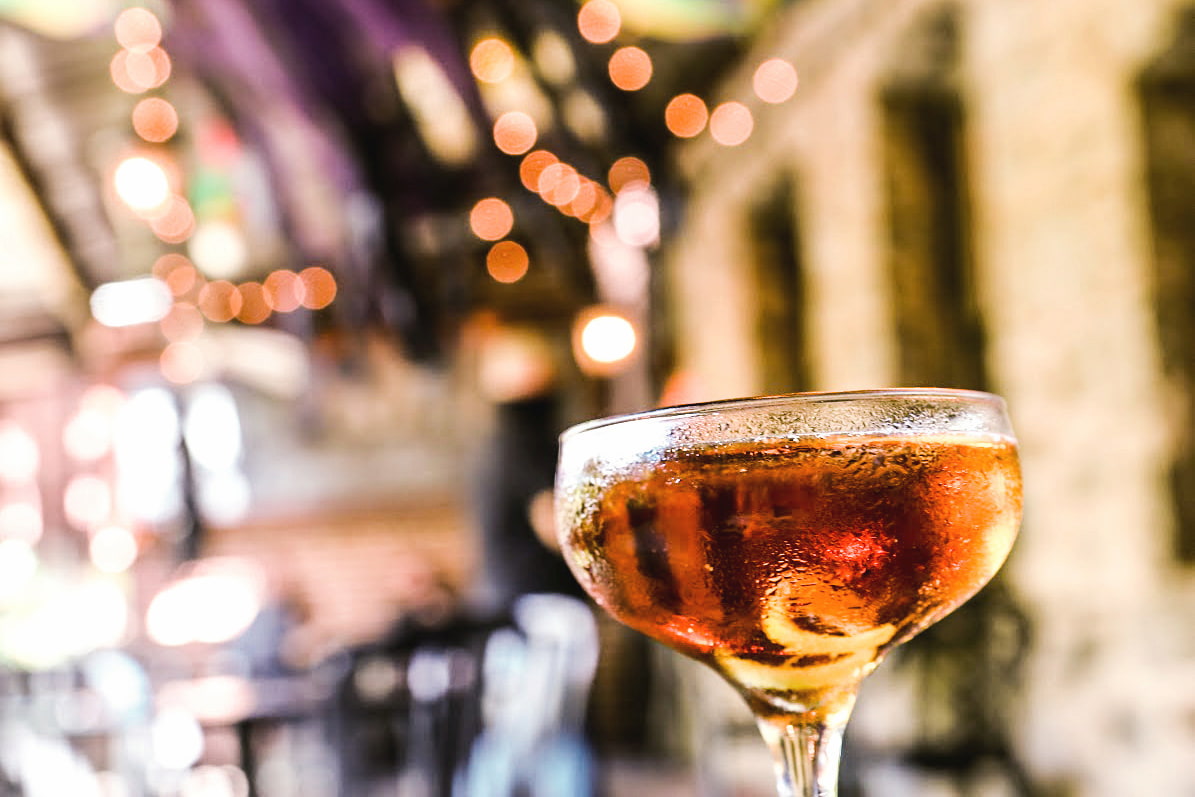 A cocktail at a Mardi Gras party