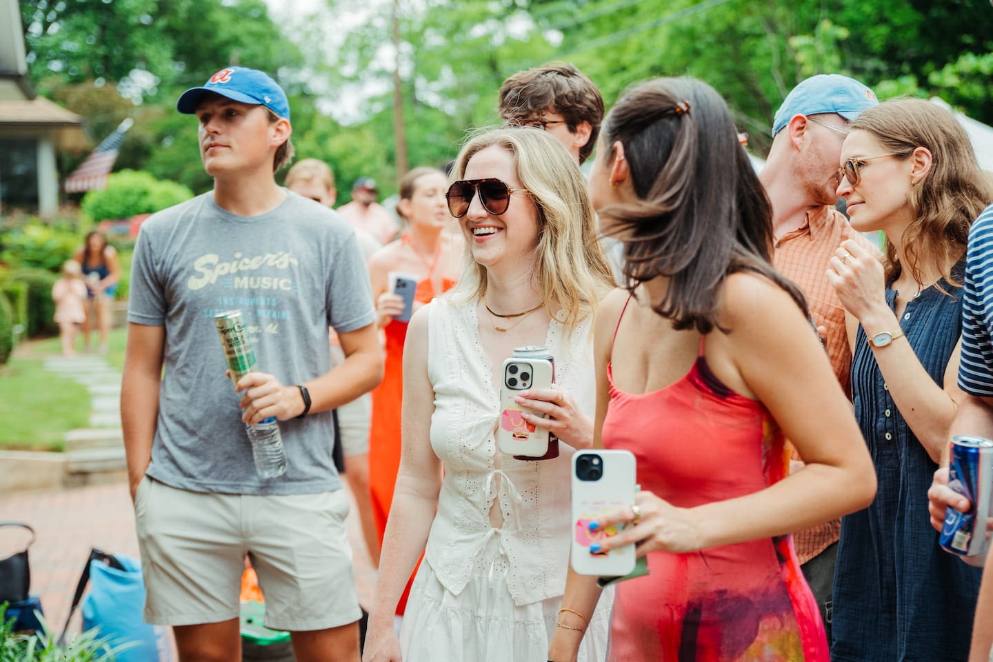 Woman and her friend enjoy a band playing at Porchfest.