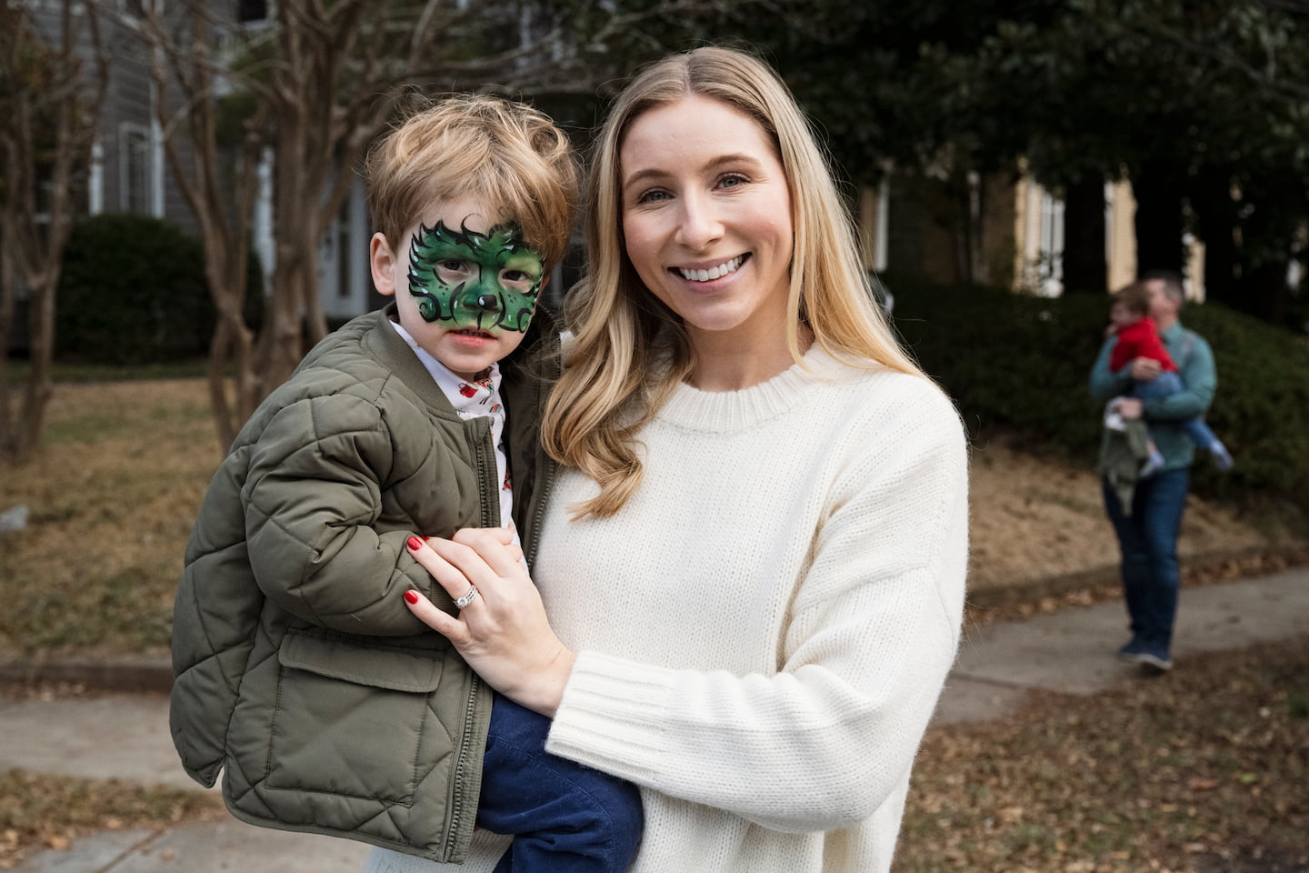 A little boy got his face painted to be the Grinch at the Winterfest Kids Corner.