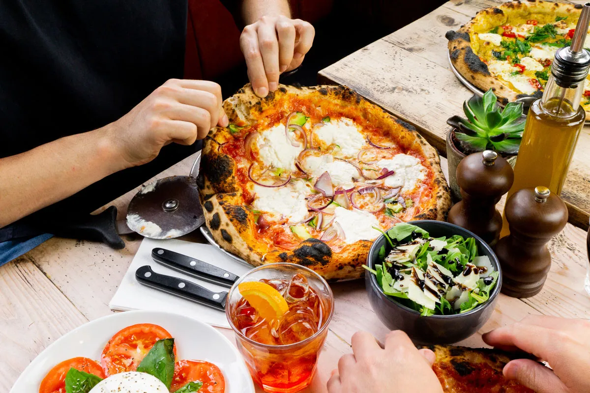 Join us on Monday and Tuesdays for delicious 2-4-1 pizzas