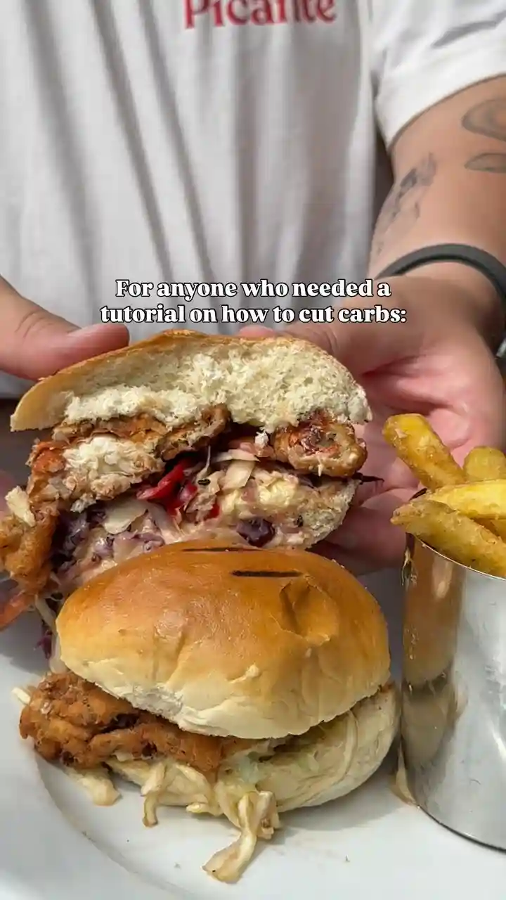The only carbs we cut around here 😉 This is our Soft shell crab burger with sweet soy & sesame slaw, mango & avocado mayo 🦀