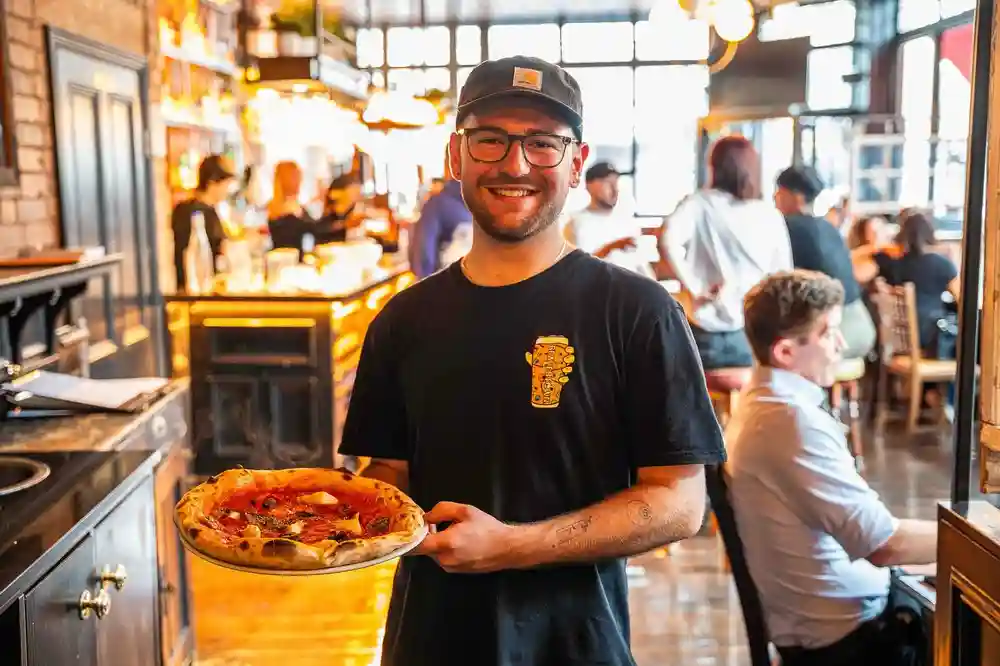 Tom’s serving up slices and smiles 🍕 ✨