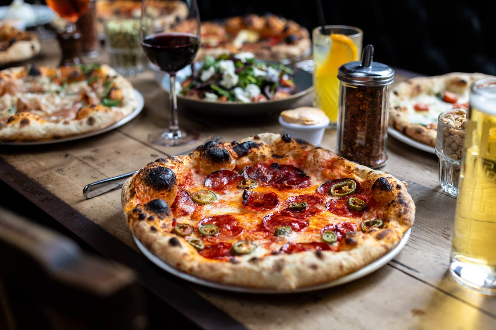 Join us at The Three Johns, our spacious, modern British pub on White Lion Street. We are a short walk from Angel Tube station, Angel shopping centre, and the buzzing Chapel market. We have lots of outside space to soak up the after-work sunshine and find your way over from the nearby Almeida Theatre. We serve a range of craft beers and boast a menu of award-winning pizzas.