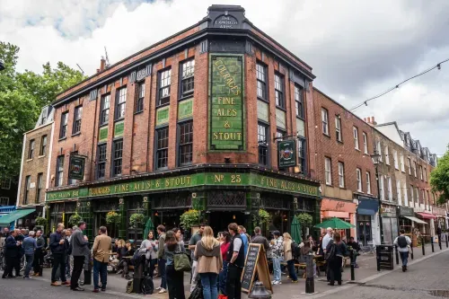 Located in the heart of Clerkenwell’s Exmouth Market, The Exmouth Arms is a vibrant Victorian pub with a striking green-tiled façade and rich character. Known for its craft beers, hearty food, and welcoming atmosphere, it’s the perfect spot for casual catch-ups or special celebrations. Whether you’re enjoying a pint, a meal, or our private upstairs bar, The Exmouth Arms is where great food, drinks, and company come together.