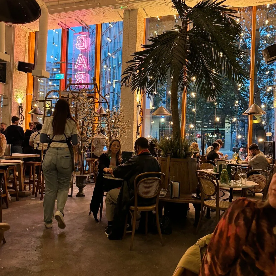 Impressive in scale and size, with double height ceilings and wrap-around windows, Serata Hall is a great space for parties and events. The design was inspired by Edwardian greenhouses and orangeries with a large curving staircase and gallery on the first floor. Our urban distillery in centre-stage and we produce, bottle and wax-seal most of our small batch gins here.