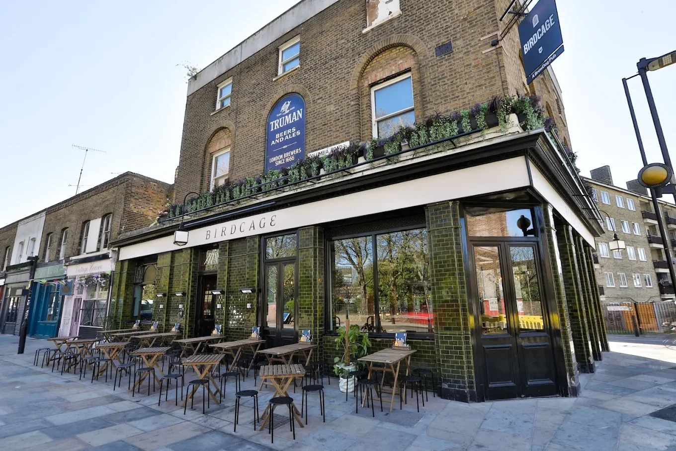 Located on the vibrant Columbia Road, The Birdcage is a pub steeped in character and charm, offering a warm and welcoming atmosphere for locals and visitors alike. With its rich history and prime location, the pub is a go-to spot for those seeking great food, exceptional drinks, and good company.