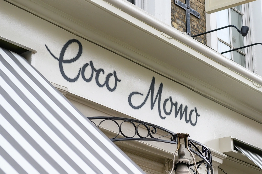 Coco Momo is your go-to neighbourhood spot, bringing laid-back vibes to one of London’s most iconic areas. Perfectly placed on Gloucester Road, we’re serving up good times from morning to evening. Whether you’re grabbing a coffee, catching up with friends, or unwinding after a long day, our bright and airy space is the ideal backdrop. Just a stone’s throw from High Street Kensington, Hyde Park, and some of London’s most famous landmarks, we’re the ultimate hangout for locals and visitors alike.