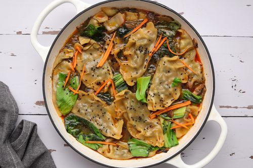 Pot of soup with dumplings