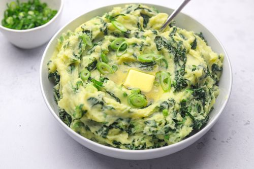 Bowl of Colcannon topped with butter