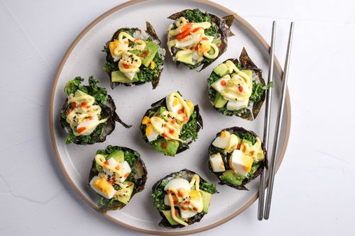 Egg cups arranged on a serving plate