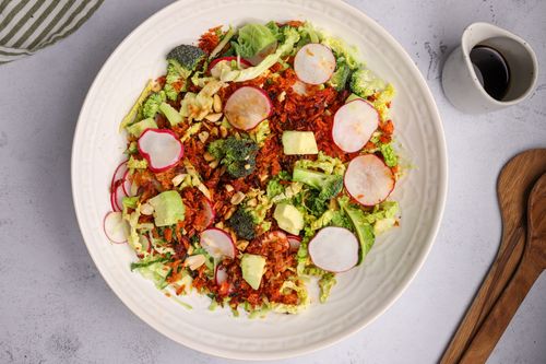 Serving plate with colourful rice salad