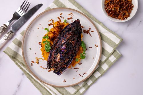 Roasted cabbage wedge with crispy shallots