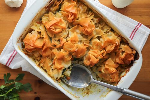 Golden filo-topped curried winter pie filled with creamy potato, carrot, cauliflower and spinach – a hearty seasonal recipe with Wonky veg.